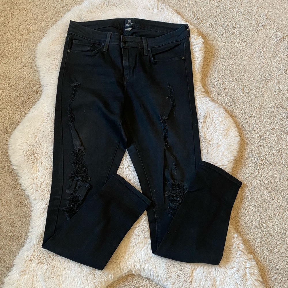 Black mid rise distressed skinny jean